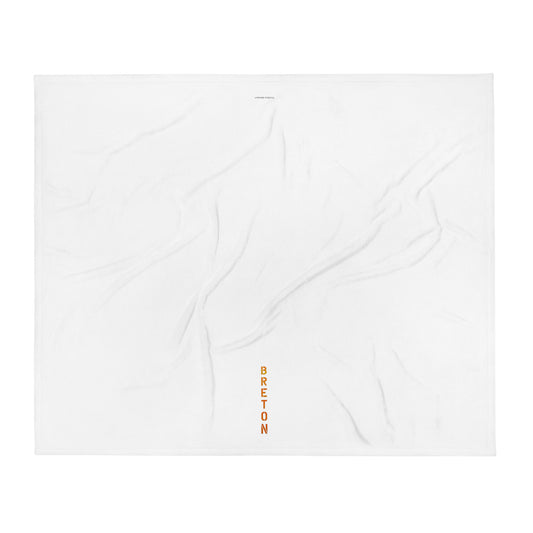 Throw Blanket small 50″×60″ white with a very cool orange BRETÓN STAMP as part of the design.